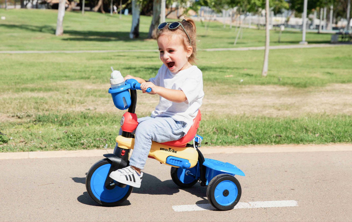 a child on a tricycle